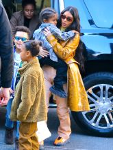 Kim Kardashian West shops at Saks Fifth Avenue with Saint West and North West