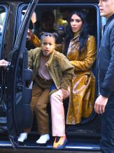 Kim Kardashian West shops at Saks Fifth Avenue with Saint West and North West