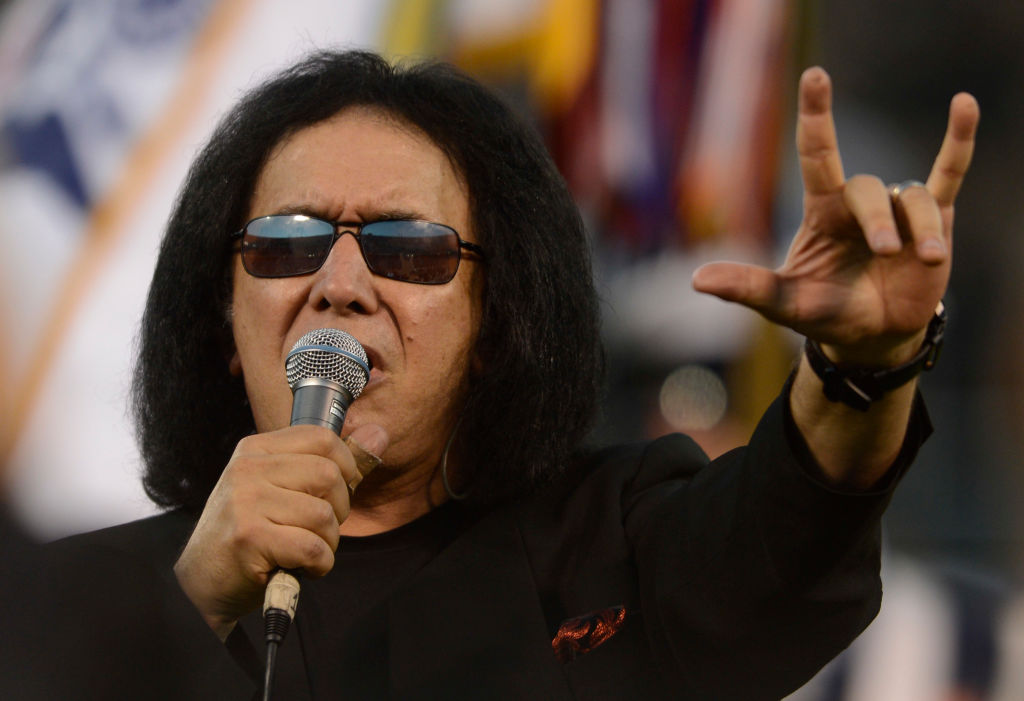 Gene Simmons performs the national anthem before the Oakland Raiders vs. San Diego Chargers game at O.co Coliseum in Oakland, Calif. on Monday, Sept. 10, 2012. (Jose Carlos Fajardo/Staff)