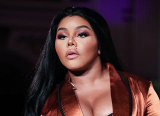 Rapper Lil' Kim performs onstage at the PrettyLittleThing x Saweetie runway show during New York Fashion Week: The Shows held at The Plaza Hotel on September 8, 2019 in Manhattan, New York City, New York, United States.