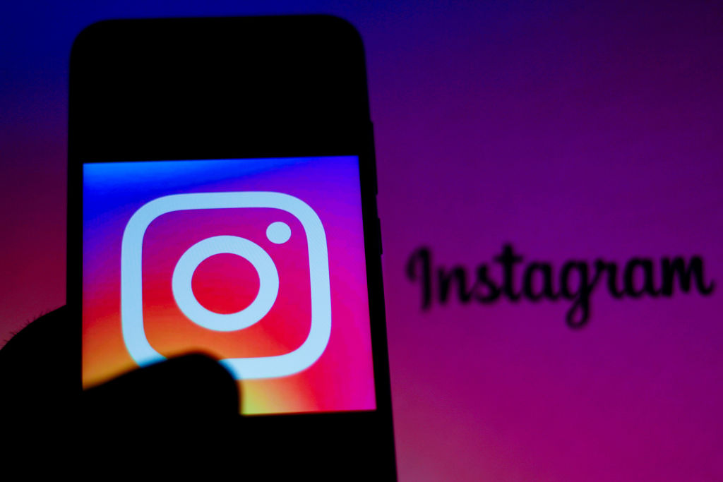 In this photo illustration the Instagram logo is seen...