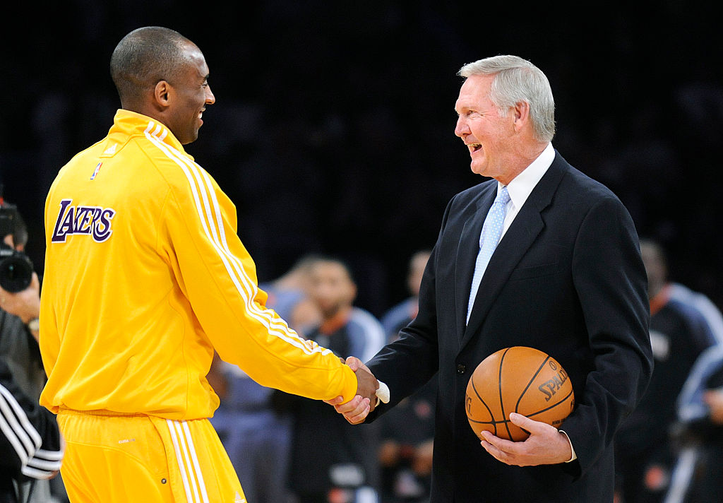 LO SANGELES, CALIFORNIA FEBRUARY 3, 2010–Lakers Kobe Bryant shakes hands with Jerry West during a c