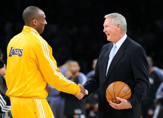 LO SANGELES, CALIFORNIA FEBRUARY 3, 2010Lakers Kobe Bryant shakes hands with Jerry West during a c