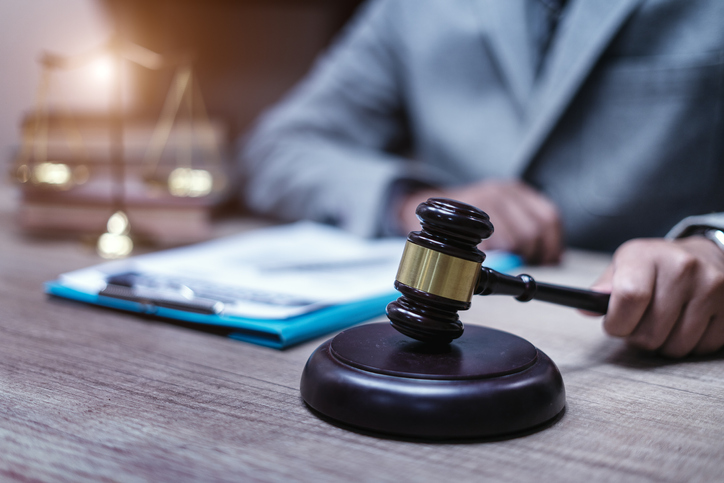 Gavel and Gold Brass balance scales.