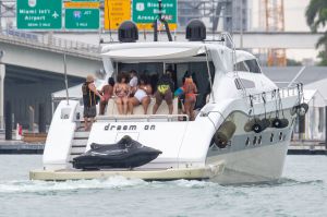 Lizzo Wears White Swimsuit In Miami