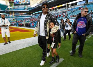 Jay-Z & Blue Ivy on the field at Super Bowl Liv