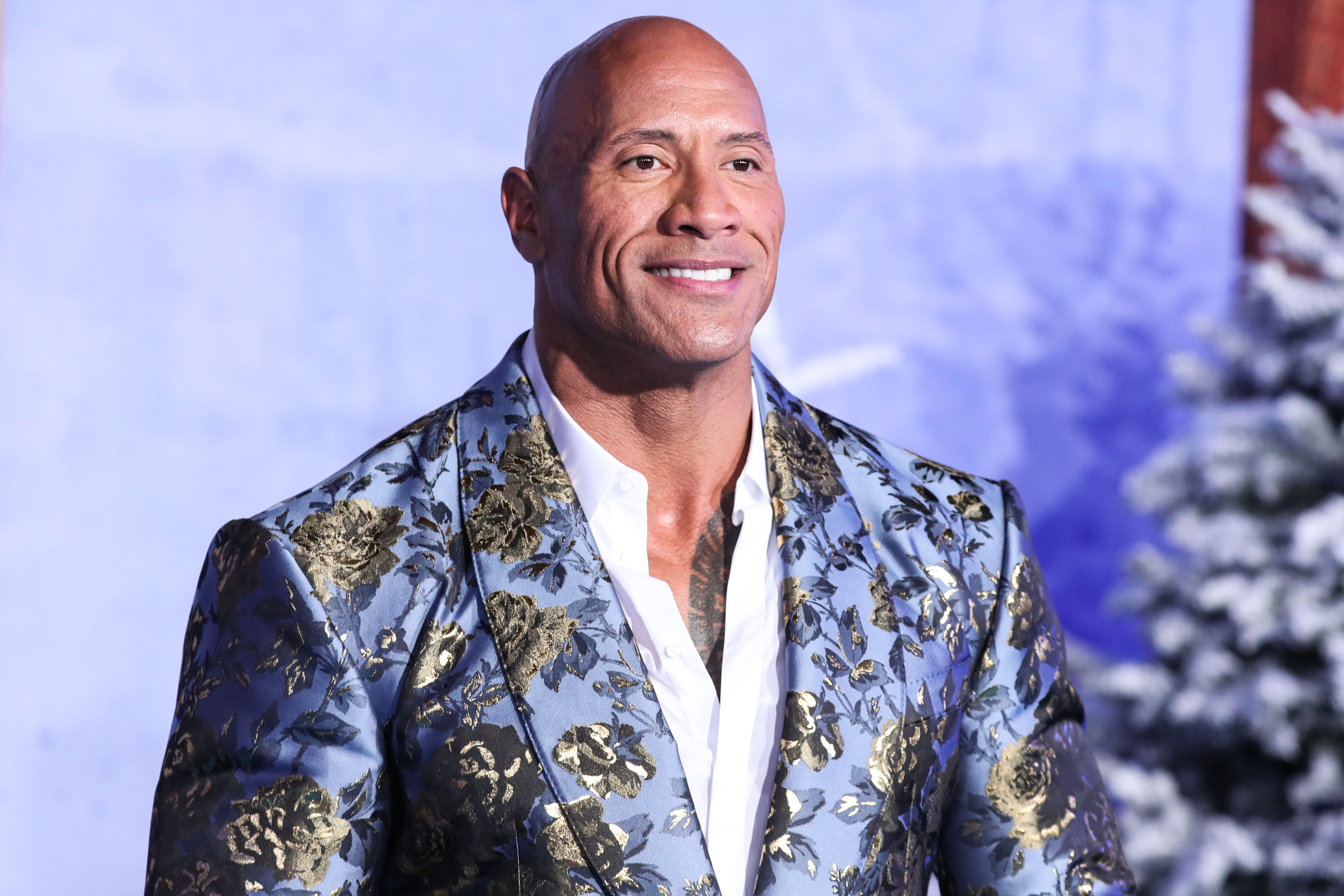 Actor Dwayne Johnson (The Rock) wearing Dolce & Gabbana arrives at the World Premiere Of Columbia Pictures' 'Jumanji: The Next Level' held at the TCL Chinese Theatre IMAX on December 9, 2019 in Hollywood, Los Angeles, California, United