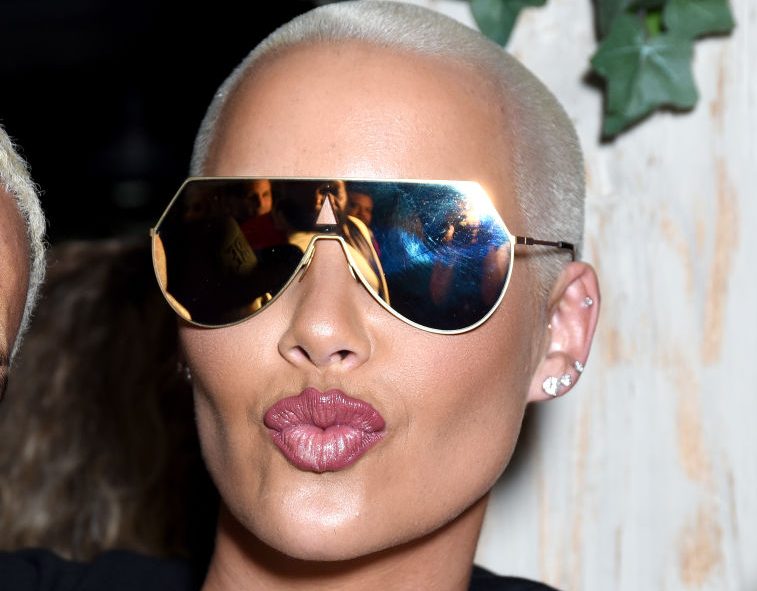 amber rose face tattoo meaning