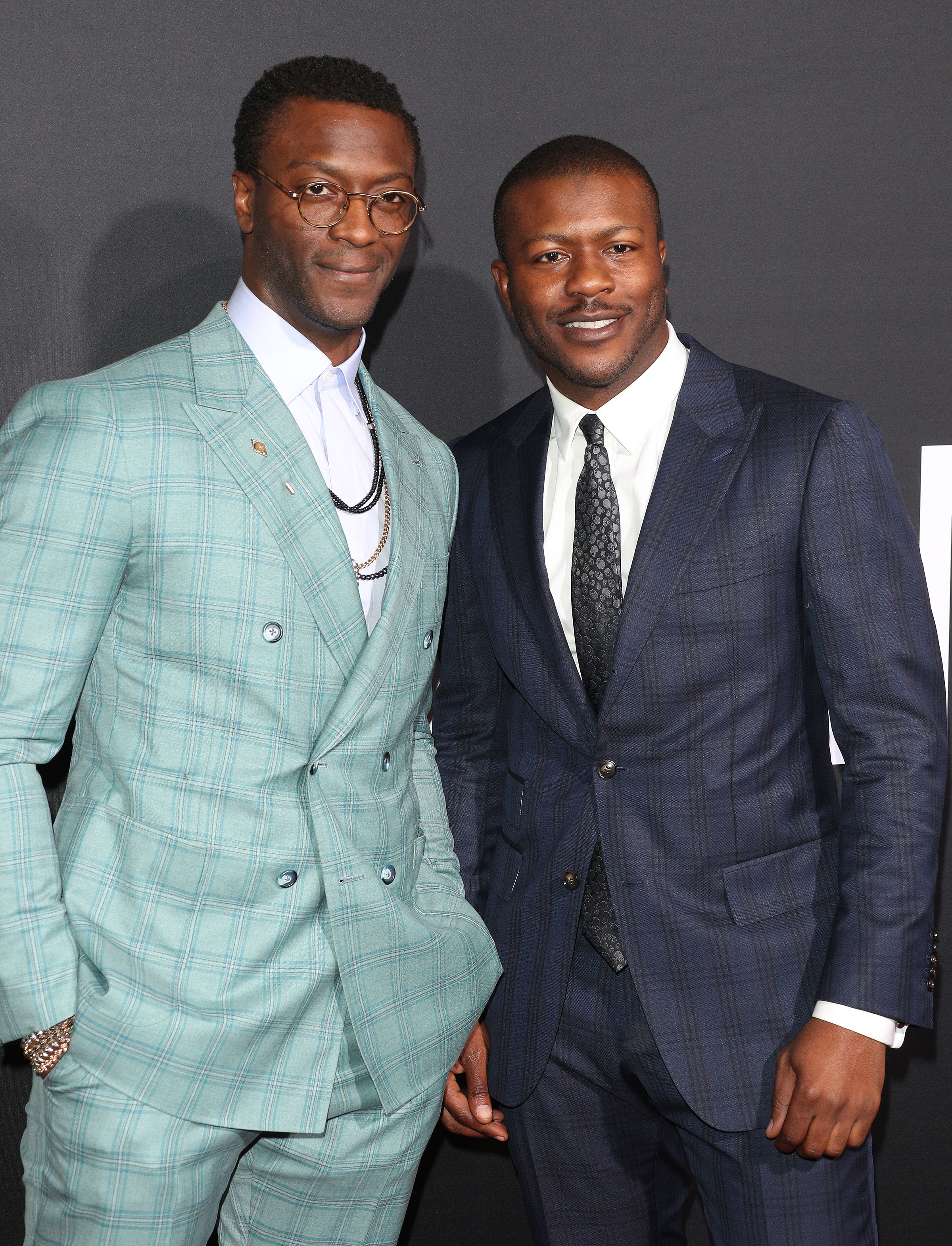 Aldis and Edwin Hodge at The Invisible Man Premiere