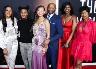 Storm Reid and her dad Rodney, mom Robyn, sisters Iman and Paris and brother Josh at The Invisible Man Premiere