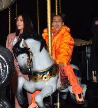 Kim Kardashian West and Kourtney Kardashian ride Eiffel Tower carousel with daughters North West and Penelope Disick