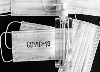Equipment for coronavirus protection. This is a set that is a mask and hand sanitizer for personal protectio from COVID-19.