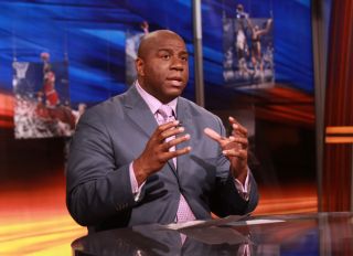 ESPN on air talent member Earvin "Magic" Johnson Jr is shown working on the NBA studio set in Bristol, Connecticut..