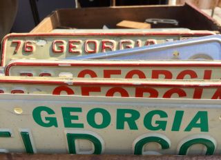 A collection of vintage license plates from Georgia USA