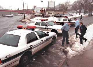 GENERAL INFORMATION: ride-along with Minneapolis cops to show crime is down in near-northside Mpls. - Thursday, Jan. 11, 2001 IN THIS PHOTO: Minneapolis police officers show their presence on the near-northside of Minnepolis when making a stop for drug s