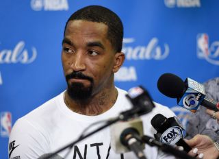 Cleveland Cavaliers' J.R. Smith (5) speaks to the media during a practice session before Game 3 of the NBA Finals at Quicken Loans Arena in Cleveland, Ohio, on Tuesday, June 7, 2016. (Jose Carlos Fajardo/Bay Area News Group)