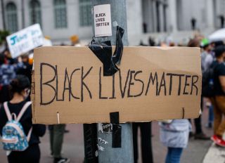 People gathered to protest the death of George Floyd and support Black Lives Matter, in downtown Los Angeles, California