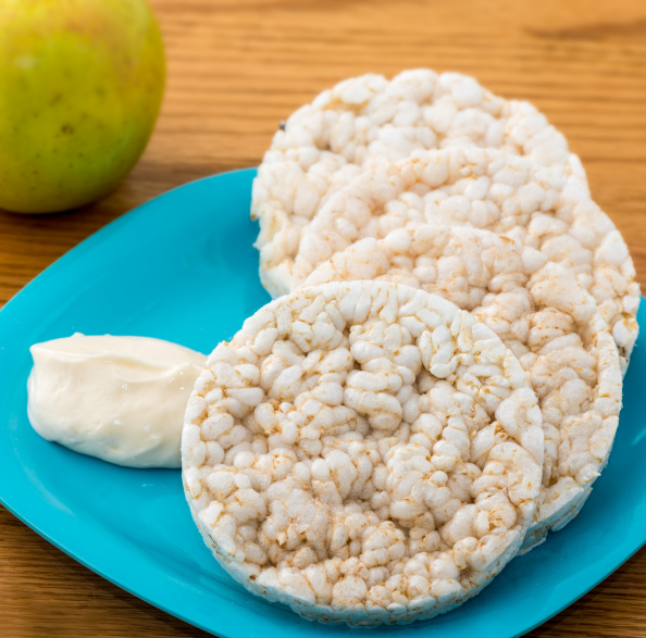 Original or classic rice cakes with a dash of mayo served in...