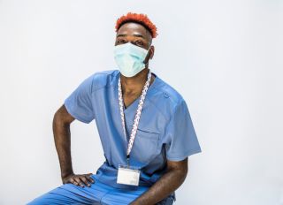 Studio portrait of male doctor/healthcare worker
