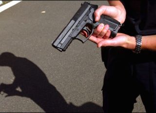 Presentation Of The New "Sig Sauer" Handgun, New Standard Equipment For The French Police And Gendarmerie. On September 24, 2003 In Paris, France