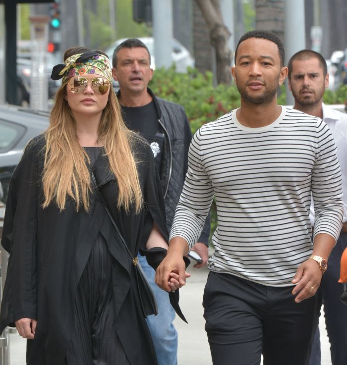 Chrissy Teigen and John Legend step out in Beverly Hills smiling and holding hands