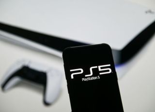 In this photo illustration a PlayStation 5 logo seen...