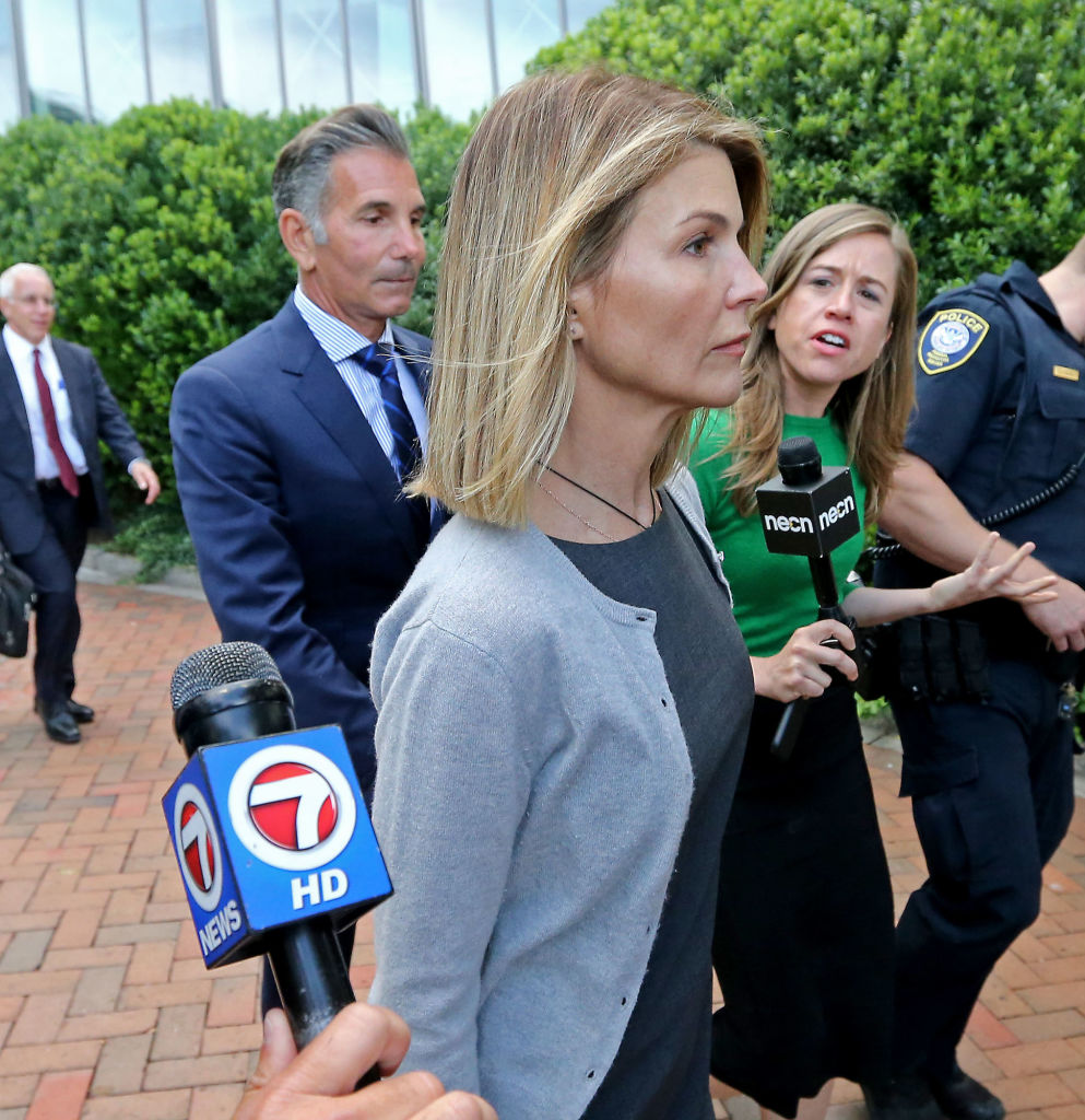 BOSTON MA. - AUGUST 27: Actress Lori Loughlin and her husband Mossimo Giannulli leave Moakley Federal Courthouse after a brief hearing on August 27, 2019 in Boston, MA. (Staff Photo By Stuart Cahill/MediaNews Group/Boston Herald)