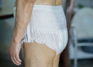 Midsection Of Senior Person Wearing Diaper