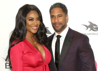 Kenya Moore and Marc Daley At The 26th Annual Elton John AIDS Foundation's Academy Awards Viewing Party