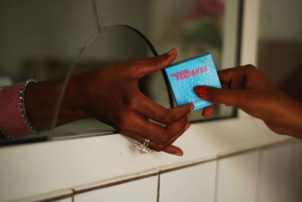 Djibouti, Djibouti city, man buying condom at pharmacy