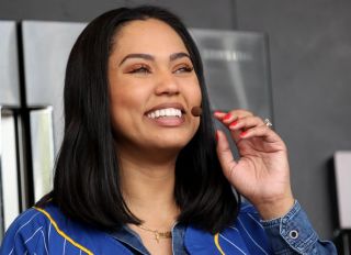 Ayesha Curry smiles as fans cheer during her cooking demonstration at the BottleRock Napa Valley music festival in Napa, Calif., on Friday, May 26, 2017. (Anda Chu/Bay Area News Group)