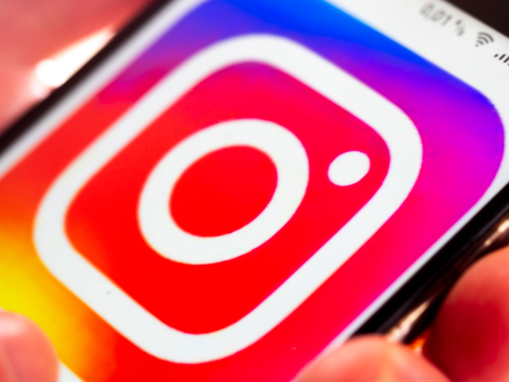 In this photo illustration an Instagram application logo...
