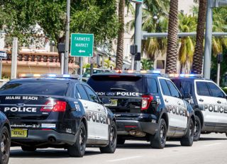 Florida, Miami Beach, police vehicles lined up on street