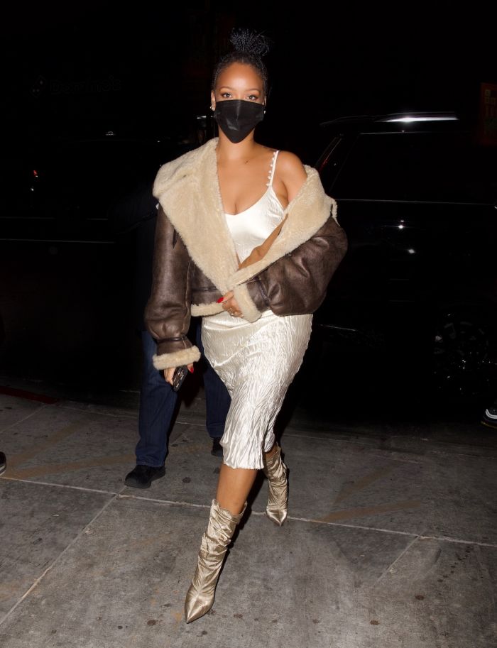 Rihanna wore a cream colored slip dress and natural colored booties for dinner out in Los Angeles