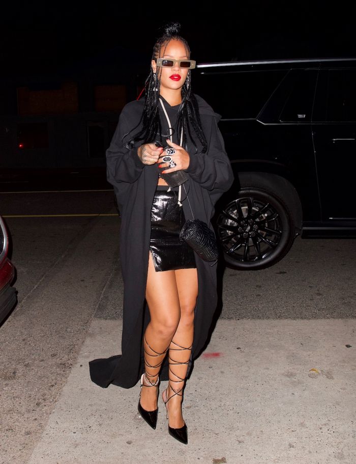 Rihanna wears all black for a night out at Giorgio Baldi