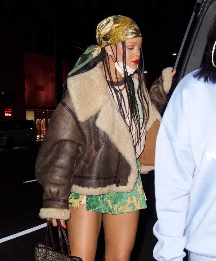 Rihanna hits The Nice Guy with a friend wearing a short skirt and green scarf