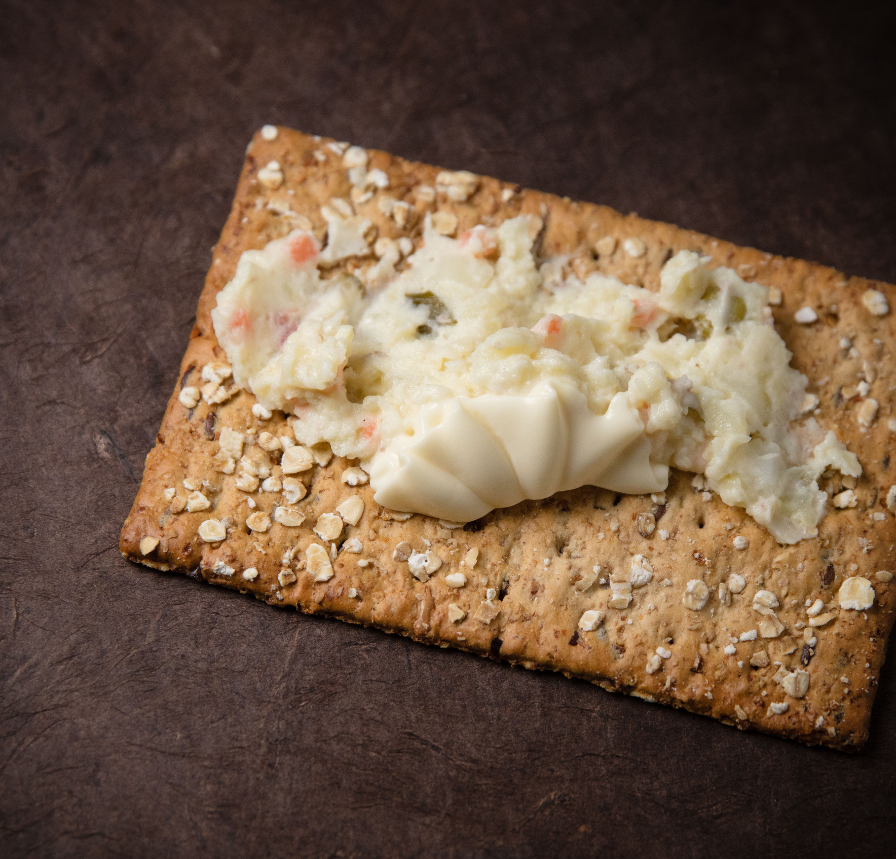 Cracker with Russian salad.
