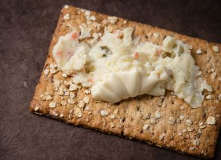 Cracker with Russian salad.