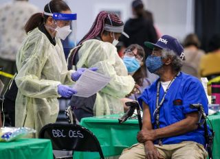 Out of state nurses working in Southern California at vaccination sites.