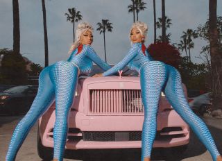 Shannade and Shannon Clermont wear blue jumpsuits pink Rolls Royce