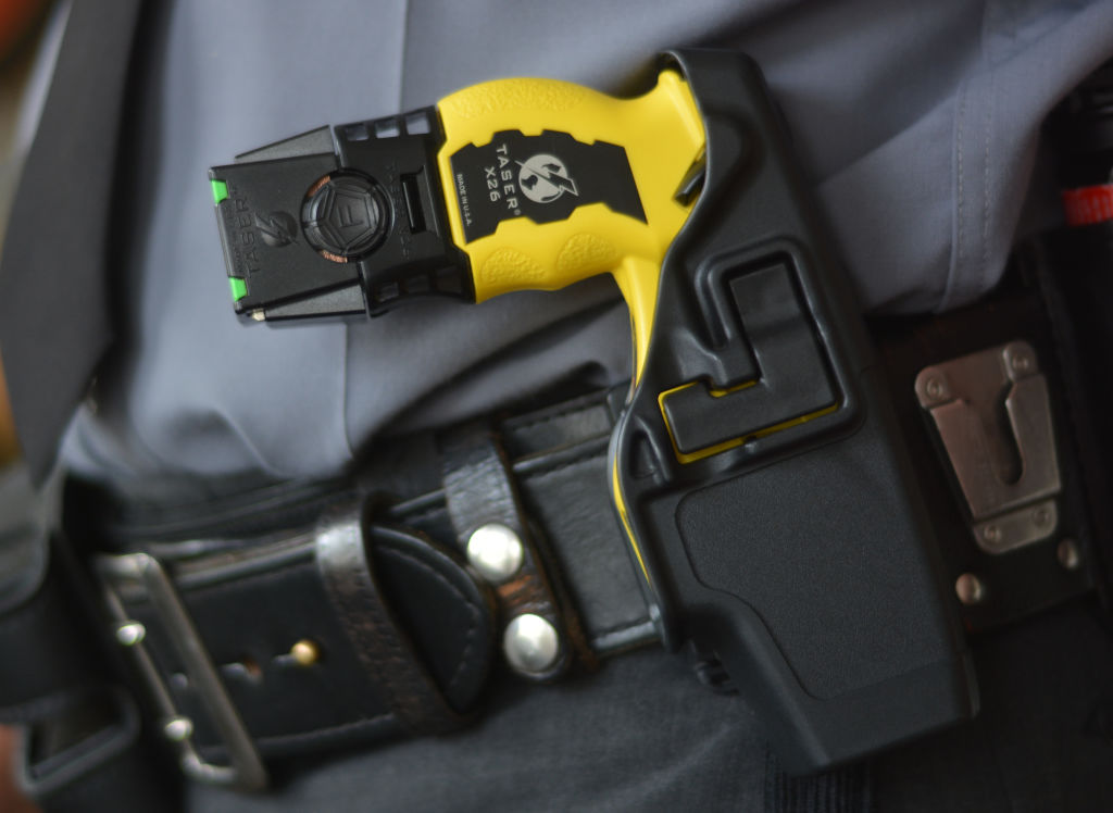 A detail photo of a Taser X26 stun gun in the holster. At the State Police Barracks for Troop L. in Reading Tuesday afternoon August 18, 2014, where Trooper David Beohm was showing us his Taser X26 stun gun. Photo by Ben Hasty