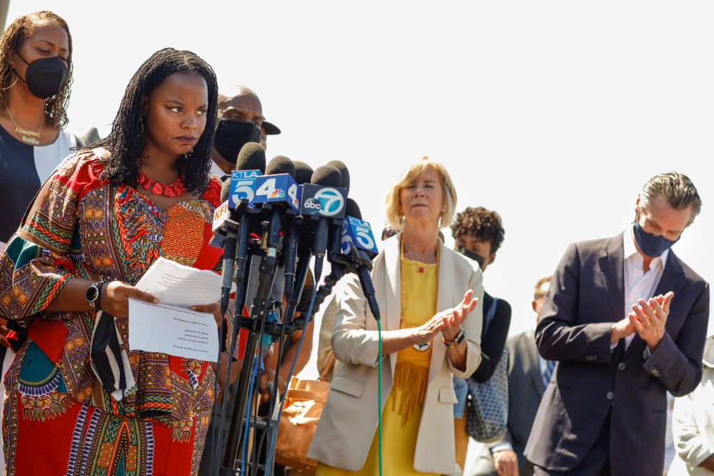 California Gov. Gavin Newsom signs SB 796 authorizing the return of beach-front land to the Bruce family, in Manhattan Beach, CA