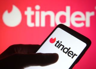 In this photo illustration the Tinder logo of an US...