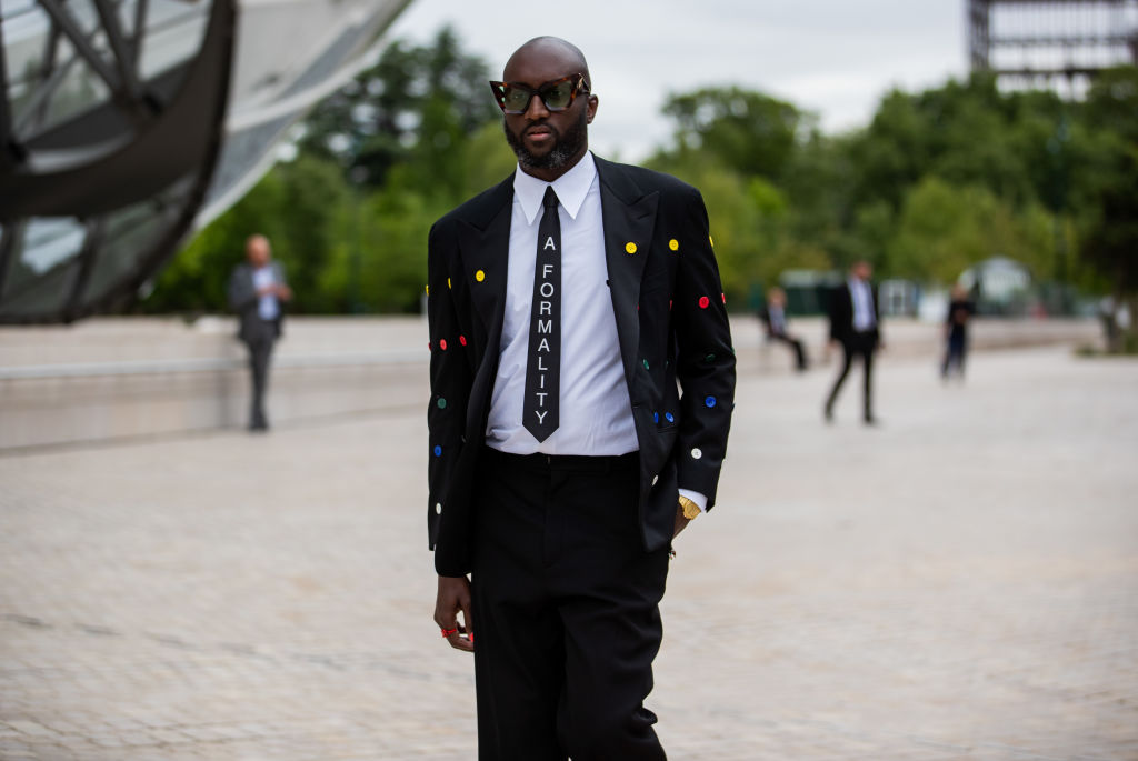 Street Style - Paris Fashion Week - Haute Couture Fall/Winter 2021/2022 : Day One