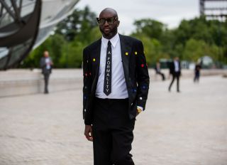 Street Style - Paris Fashion Week - Haute Couture Fall/Winter 2021/2022 : Day One