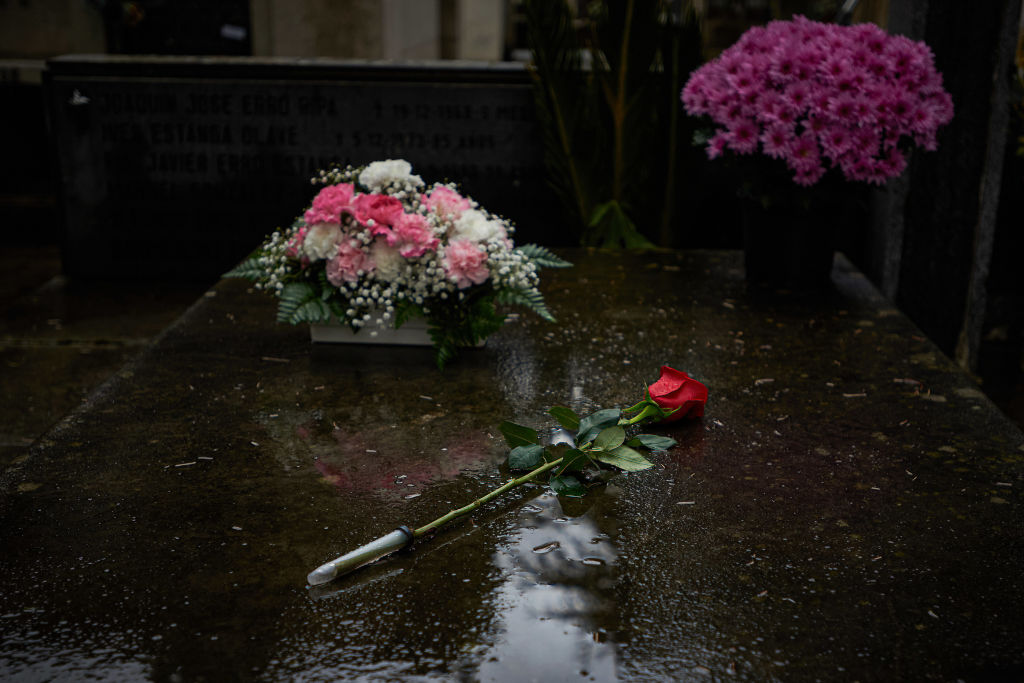 Flowers have been placed on top of a grave at the Spanish...