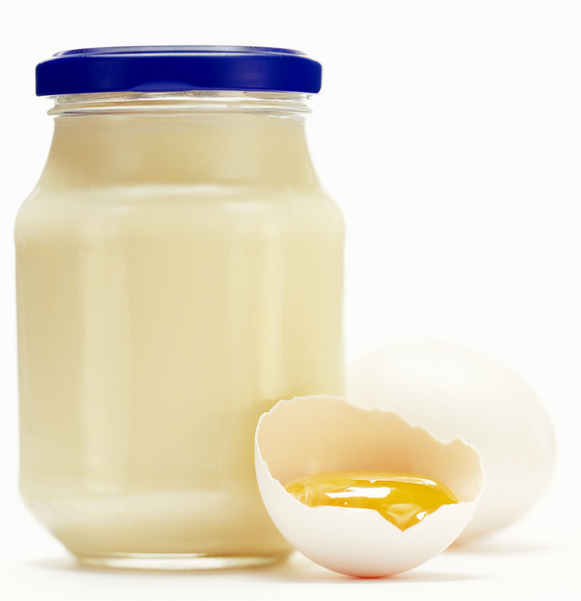 A Jar of Mayonnaise with Egg Yolk in Shell