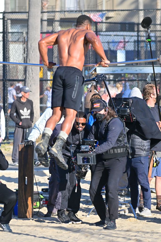 Micheal B Jordan Directs "Creed III' In Venice Beach Ca Where A Shirtless Jonathan Majors Works Out Shirtless Under His Direction