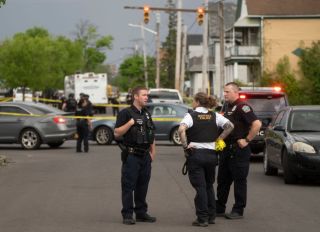 BUFFALO, NY - MAY 14: Police are posted on Riley Street after a