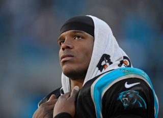 Carolina Panthers starting quarterback Cam Newton (1) stands dejected as the final minutes wind down while playing against the San Francisco 49ers in the fourth quarter of their NFC divisional playoff NFL game at Bank of America Stadium in Charlotte, N.C.